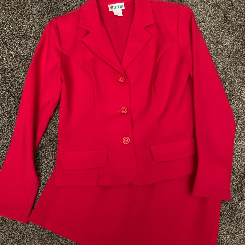 Short blazer with mini skirt.